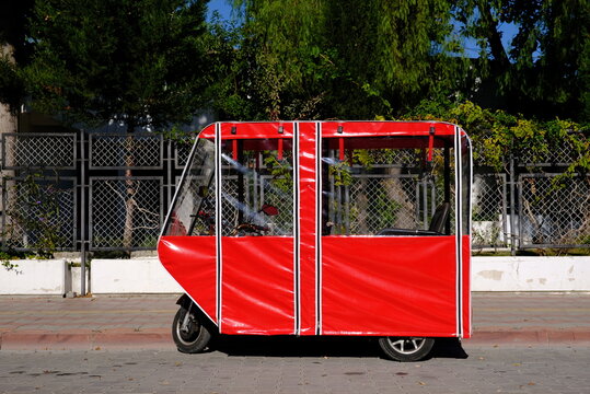 electric vehicle with wheather cover 
