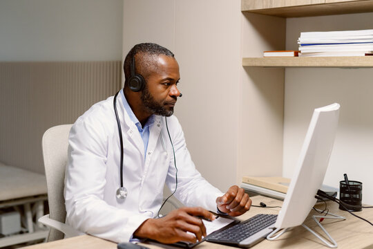 African american physician busy device clinic