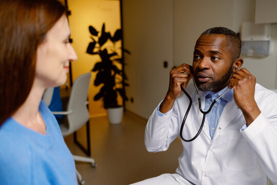 African-American physician examination stethoscope office