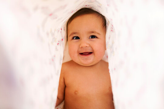 adorable baby girl laughing 