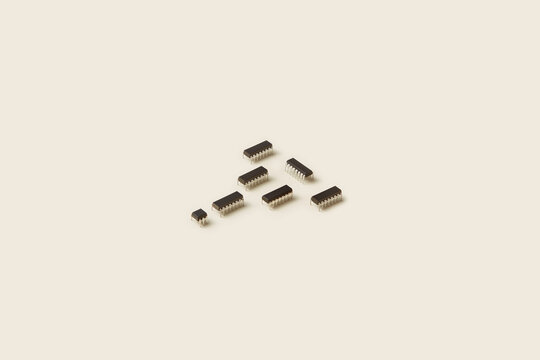 Simple integrated circuits laid out on beige background.