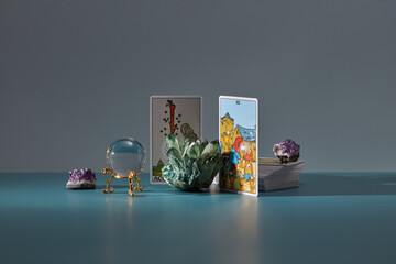 Tarot cards with magic quartz and crystal sphere.