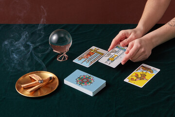 Tarot reader laying out cards.