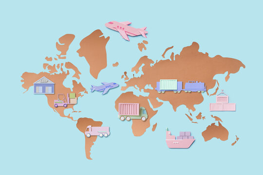 Paper cargo transport over brown paper world map.