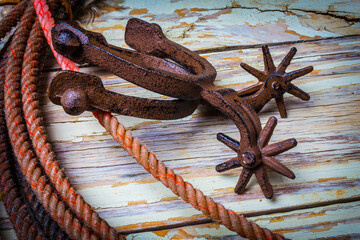 Rusty Spurs And Rope - obrazy, fototapety, plakaty
