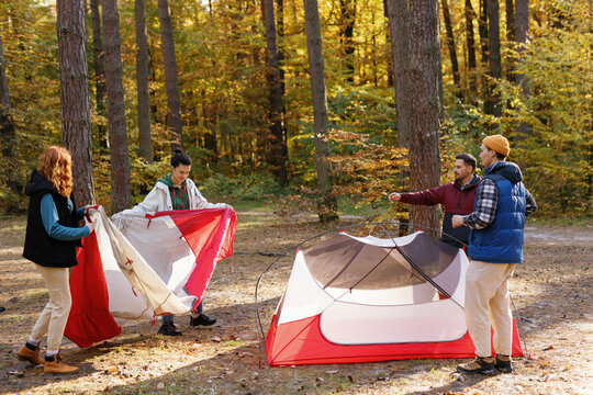 Set up tent adventure nature installation teamwork vacation 