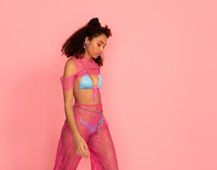 Model with trendy beachy colorful look, studio shot