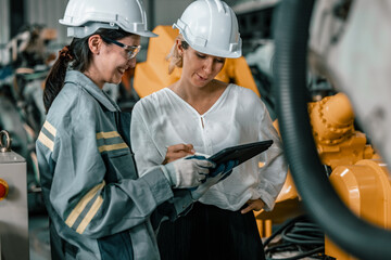 Fototapeta premium Robotic supervisor offer robotic machine services to clients to improve efficiency of their operational and manufacturing processes. Care, trust, and commitment in deals between business to business.