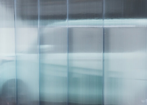 Reflection of the mint car in the wall