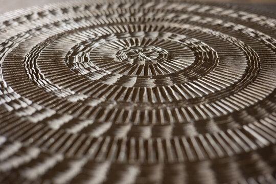 Artisanal Circular Wood Table with Symmetric Texture in Close-up View
