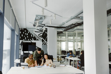 Colleague collaborative discussion office brainstorm paper