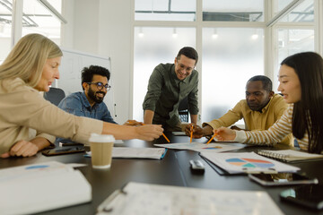 Multicultural businesspeople job meeting together