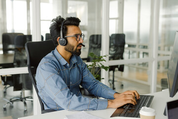 Casual entrepreneur working desktop online connection