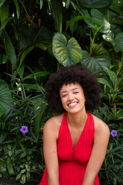 Happy Woman In Tropical Plants Background