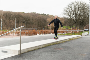 Senior man practising skates