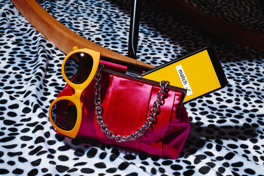 smartphone with the text match in a purse