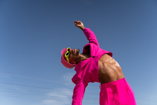 Fashion queer dancer at beach