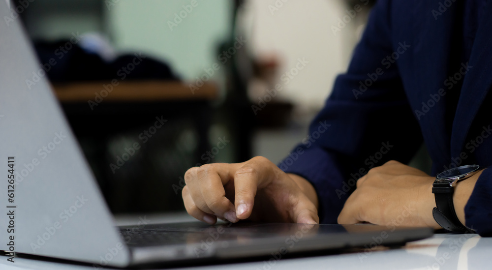 Poster freelancer man using laptop notebook computer working online at home. technology and business concep