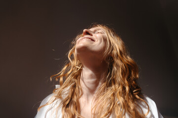 Portrait of a blonde hopeful woman