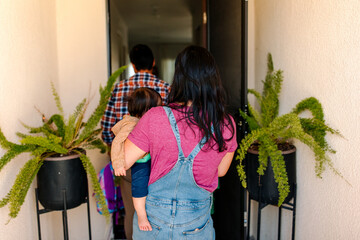Asian family coming home together