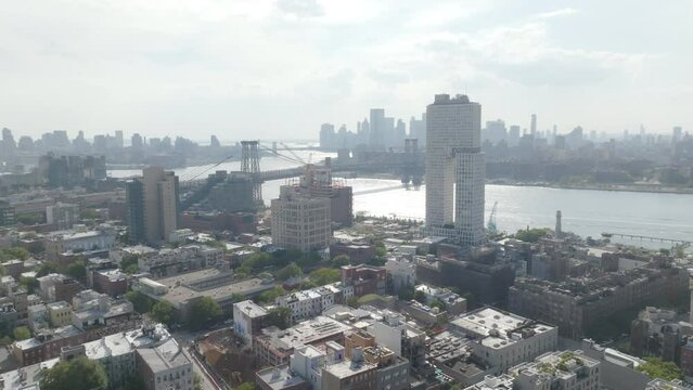 Factories and luxury apartment buildings adorn the waterfront in Brooklyn