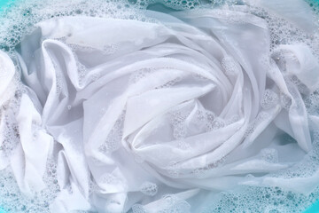 Soak a cloth before washing, white cloth
