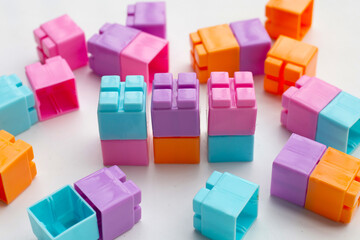 Obraz premium Plastic building blocks isolated on white background. Top view