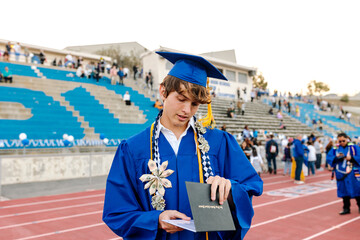 New graduate with diploma