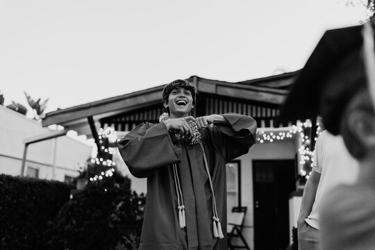 Happy graduate at home