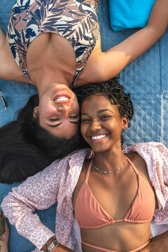 Happy grils having fun on beach