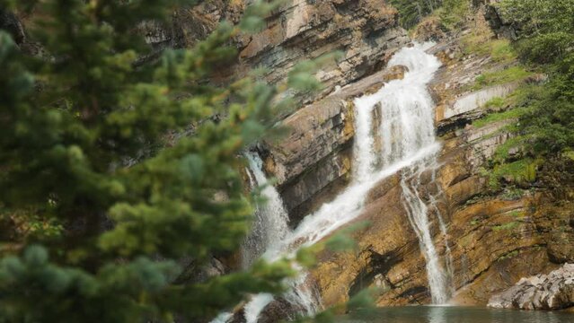 Cameron Falls waterfall streaming down the rocks. Slow motion. 