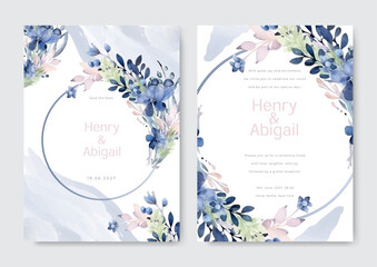 Beautiful blue wedding invitation card with watercolor floral decoration and abstract background