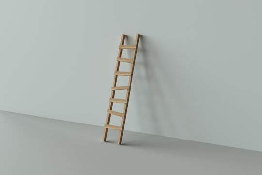 wooden ladder against a white wall