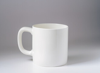 A Close-Up Shot of A Plain White Coffee Mug Mock-up with Softbox Lighting