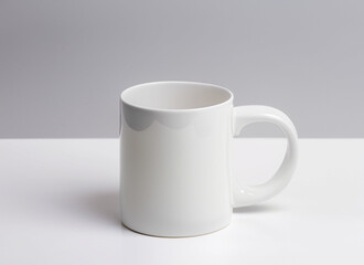 A Close-Up Shot of A Plain White Coffee Mug Mock-up with Softbox Lighting