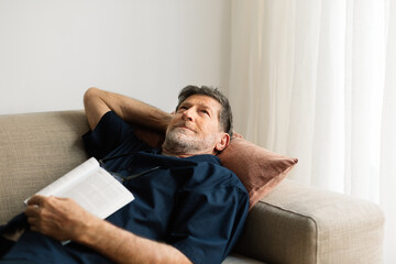 Man Relaxing on Couch at Home