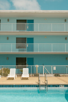 Motel Exterior with Blue Swimming Pool