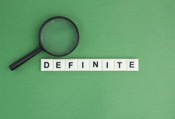 letters of the alphabet with the word definite. stated or decided clearly, not vague or doubtful.