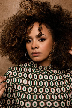 Beautiful latin woman with curly hair