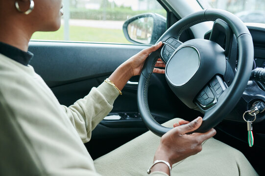 Young woman driving a car