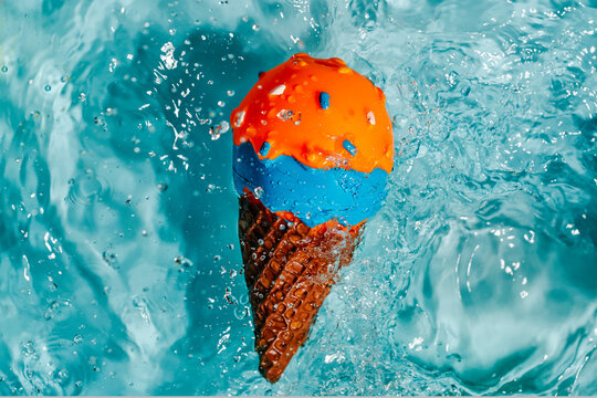 Plastic Ice Cream Cone Floating On The Water