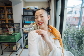 UGC selfie of young woman at home with her pets