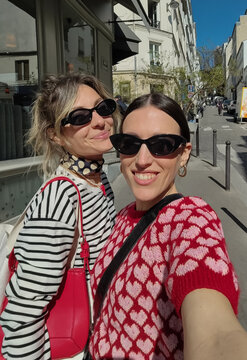Two Friends Taking a Selfie in Paris 