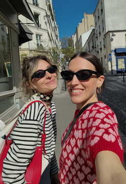 Two Friends Taking a Selfie in Paris 