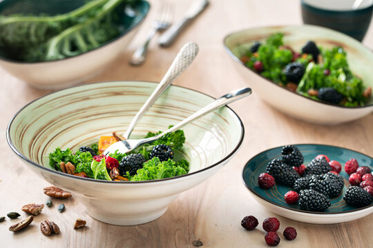 Blackberry, pumpkin and kale salad with pecans and cranberries