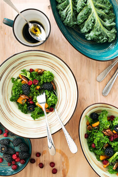 Blackberry, pumpkin and kale salad with pecans and cranberries