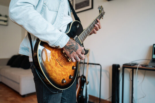 Close-up of guitar strumming