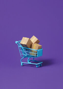 Many shopping bags in a shopping cart for online shopping concept