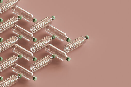 a triange of plastc bottles.