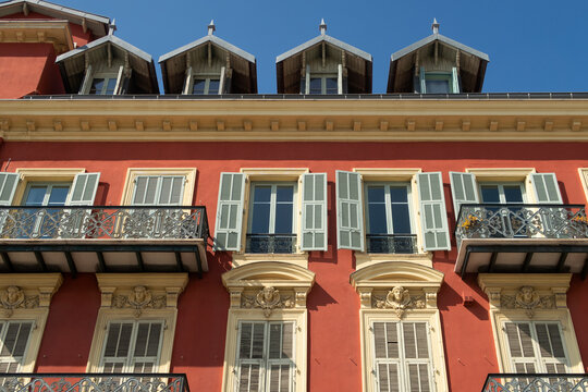 stylish orange building facade and blue sky